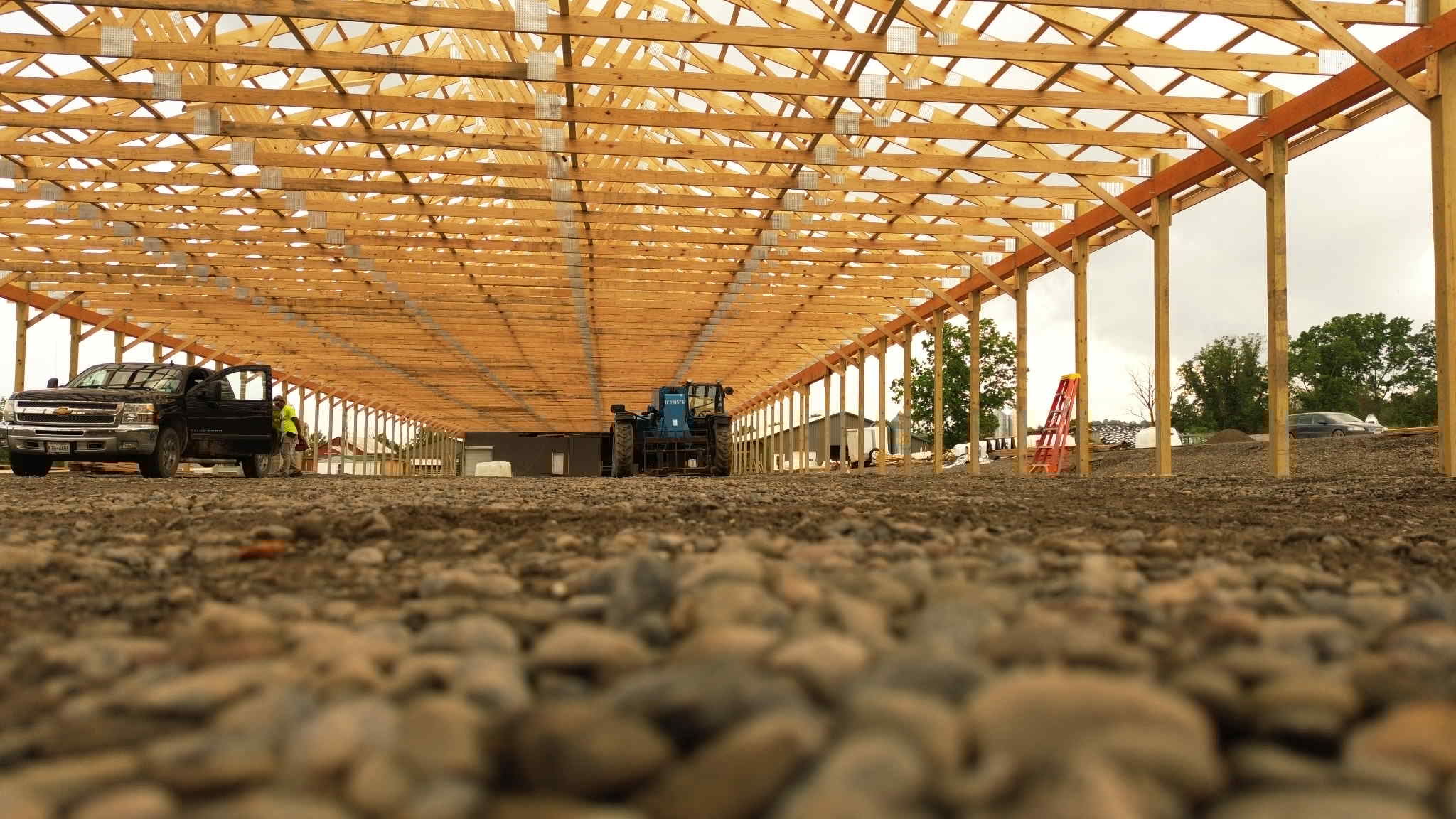 Pole Barn Under construction inside at ground level